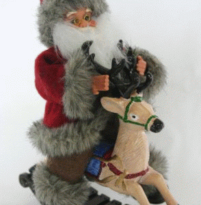 Santa på  hjort 18cm